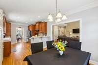 Kitchen with dining room in the background