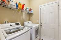 Laundry and pass through to 2 car garage