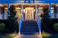 Beautiful wide front steps lead to the front porch. Plenty of room for chairs to enjoy the views.
