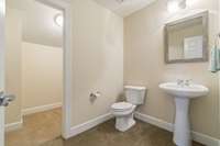 Powder Room off Bonus Room too