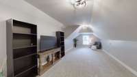 Newly renovated bonus room with new carpet, paint and lighting. Access to large storage room!
