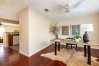Great light-filled rooms, wide hallway to kitchen and family room.