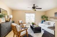 Expansive family room open to the kitchen and also a private back patio