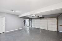 New epoxy flooring in 3 car garage.