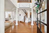 This showcases 1 of the 2 staircases in this beautiful home.