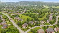 All the greenery and the sidewalks make this neighborhood so inviting.