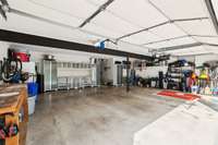 See what I mean when I say lots of storage in this 3 car garage!