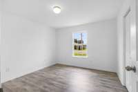 Bedroom number two offers fresh paint, double closet and a great view of the front yard. This room could make a great home office!