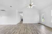 Here is the view while leaving the main bedroom looking into your living room space.