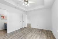 Did you notice the trey ceiling, the fresh paint and the new flooring...