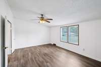 Spacious Primary bedroom off the formal dining area