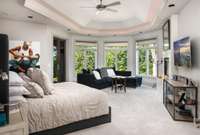 Primary suite on 2nd floor features patio and overlooks pool.