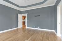 Primary Bedroom With Coffered Ceilings