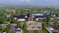 Artist's rendering of upcoming Amenity Center: Indoor Pool, Hot Tub, Fitness Center, Catering Kitchen, Pickleball, Bocce Ball, Pond, Arboretum, Amphitheater, Veteran's Memorial Park, Outdoor Dining Pavillion, Firepit, Walking Paths, and more!
