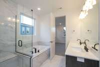 MUD SET FRAMELESS SHOWER WITH SEAT AND LARGE SOAKING TUB