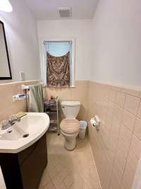half bathroom in master bedroom