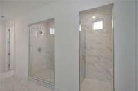 MUD SET WALK IN SHOWER WITH CERAMIC TO CEILING AND RAIN SHOWER HEAD
