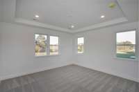 MASTER BEDROOM WITH COFFERED CEILING