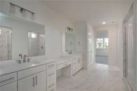 PRIMARY BATHROOM INCLUDES DRAWERS IN VANITY AND LINEN CLOSET