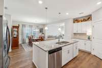 Stainless appliances and granite tops highlight this beautiful area