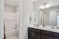 Hall bath with double sinks