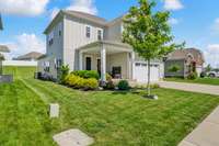 Enjoy this spacious front porch area and a neighborhood with a community pool, playground and sidewalks.