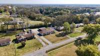 Aerial view of home and property. Give Darla a call; it is priced to sell and ready for its new owners.