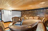 The poker table sits in the rec room upstairs and is ready for a chill evening in with friends.