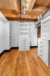 large master closet with plenty of storage