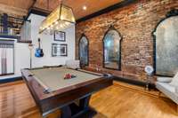 Massive living space has plenty of room for the pool table!