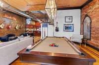 Massive living space has plenty of room for the pool table!