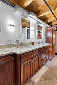 Dual vanities & updated light fixtures make it easy to get ready for a night on Broadway!