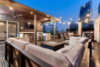 Nighttime on the rooftop terrace is the perfect place to start your evening out!