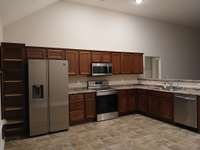 Cabinet Pantry has adjustable Shelves and Extra Storage Space.