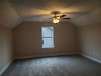 Finished Bonus Room has High Knee Walls for more open space.