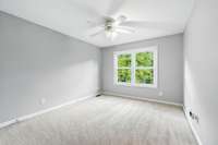 Downstairs bedroom with lots of natural light