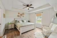 The Owner Suite Bedroom is spacious with a tray ceiling, adjoining full Bath and walk-in closet!