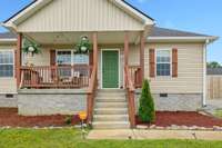 This home has a nice front porch to enjoy the evening sunsets!