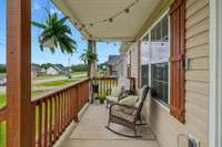 Looks like a comfy porch to relax on!
