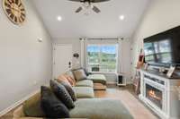 The Great Room has a vaulted ceiling and awesome laminate flooring in the main areas of the home!