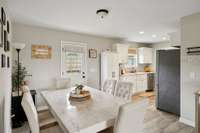 This open concept Dining area connects to the Great Room and has a door to the back yard!