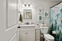 Hall Bath located between Bedroom 2 and Bedroom 3. Both Baths have granite countertops, single sinks and combo tub/shower!
