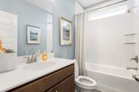 Full guest bathroom available without going through bedrooms.