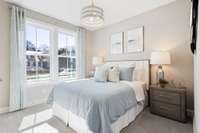 2 guest bedrooms downstairs in the front of the home.