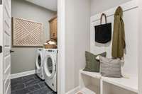 Laundry and valet off of garage entry.