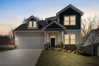 *Photo is not of actual home on lot #88. Estimated completion is in August 2025. This photo is a completed Drummond plan in The Preserve at Five Oaks.
