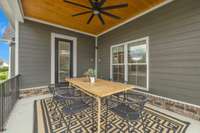 This large patio space looks out on the spacious backyard and firepit!