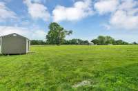 Side/back yard - new storage shed to remain with home!!!