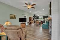 View from front door. Open living room/kitchen concept.
