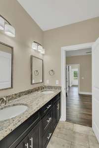 Guest/hall bathroom complete with double vanity.